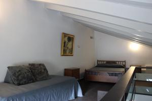 Postel nebo postele na pokoji v ubytování Chorio House Platanias