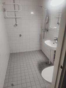 Ένα μπάνιο στο Helmiapartments Sotkamo