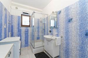 Kúpeľňa v ubytovaní Apartment Feruccio by Rent Istria