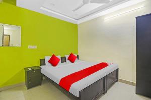 Katil atau katil-katil dalam bilik di Hotel O Avasya Residency