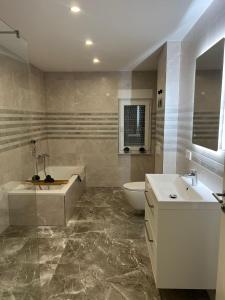 Koupelna v ubytování Luxury Apartments Marz