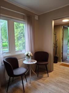 Posezení v ubytování Kattugglans Guestroom