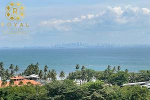 a view of the ocean and a city at Royal Suites Studio 6ZR - Kaina Tower at Nuvasa Bay in Pulau Nongsa