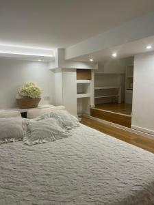 Posteľ alebo postele v izbe v ubytovaní Modern Mini Loft apartment Roma