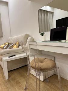 Televízia a/alebo spoločenská miestnosť v ubytovaní Modern Mini Loft apartment Roma