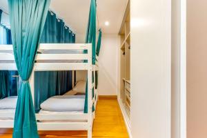 Postel nebo postele na pokoji v ubytování Cozy Nest