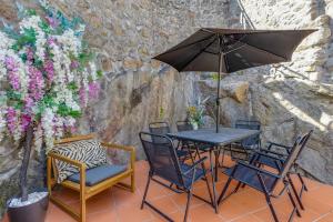 Patio nebo venkovní prostory v ubytování Cozy Nest