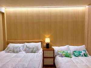 TOKYO SKYTREE HOUSE-Multiple room stylesにあるベッド