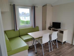 Et tv og/eller underholdning på Camping L'oiseau Blanc