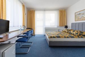 Łóżko lub łóżka w pokoju w obiekcie La Residence Kasandra