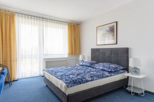 Łóżko lub łóżka w pokoju w obiekcie La Residence Kasandra