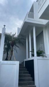 Balkón nebo terasa v ubytování Nukumari villa & Homestay + 7 fotografií