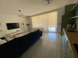 Kuchyň nebo kuchyňský kout v ubytování Jon Apartment 3- San Pietro Resort- Gjiri i Lalzit + 1 fotografie