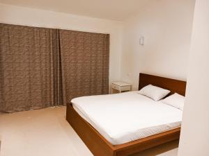 Ένα ή περισσότερα κρεβάτια σε δωμάτιο στο Hacienda White 6 Bedroom Villa