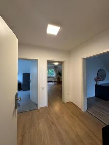 TV a/nebo společenská místnost v ubytování Moderne Ferienwohnung + 11 fotografií