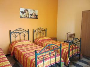 A bed or beds in a room at Casa Josephine