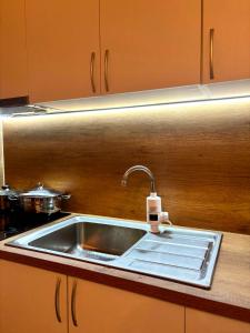 Η κουζίνα ή μικρή κουζίνα στο GM Apartment 1