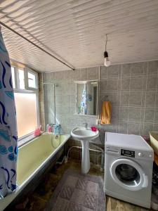 Koupelna v ubytování MAANAY Guest House + 11 fotografií