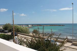 a view of the ocean from a balcony at Casa fronte mare a Torre Vado 2 in Torre Vado