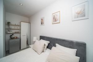 Korkyra Harbour Rooms客房内的一张或多张床位
