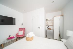 Korkyra Harbour Rooms客房内的一张或多张床位