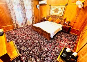 Hayat Group of houseboats客房内的一张或多张床位