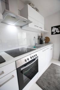 Η κουζίνα ή μικρή κουζίνα στο Cozy apartment in Siegen