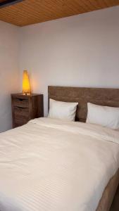 Postel nebo postele na pokoji v ubytování Todor Resort