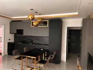 Μια τηλεόραση ή/και κέντρο ψυχαγωγίας στο Oasis Lux +4 φωτογραφίες