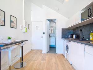 Η κουζίνα ή μικρή κουζίνα στο Suite Big Dream - Appartement central