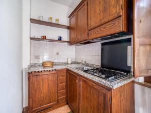A kitchen or kitchenette at Lovely Apartment in Citerna with Swimming Pool