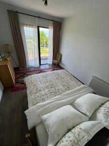 Postel nebo postele na pokoji v ubytování Chateau Resse