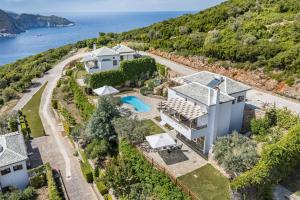an aerial view of a villa with a swimming pool at Kohili Villas in Skopelos Town