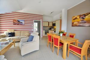 Posezení v ubytování Ferienwohnung Admiralssuite + 9 fotografií