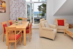Posezení v ubytování Ferienwohnung Admiralssuite