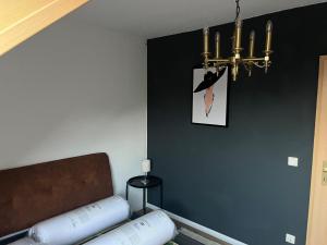 Ένα ή περισσότερα κρεβάτια σε δωμάτιο στο Sunshine-Apartment