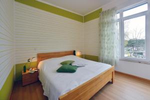 Postel nebo postele na pokoji v ubytování Ferienwohnung Admiralssuite