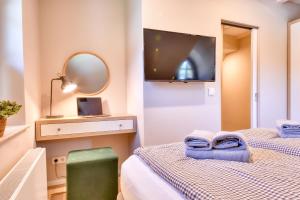 Ένα ή περισσότερα κρεβάτια σε δωμάτιο στο Ferienhaus Boddenbrise 13 Feriendorf Klein Stresow Rügen by ruyastay