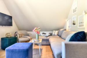 Χώρος καθιστικού στο Ferienwohnung Wandashorst 25 Feriendorf Klein Stresow Rügen by ruyastay