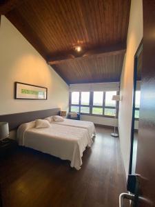 Postel nebo postele na pokoji v ubytování La Boz, Nucleo Turístico Rural