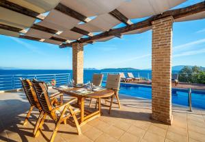 The swimming pool at or close to Iris Villas Lefkada - Karavi Villa with private sea access