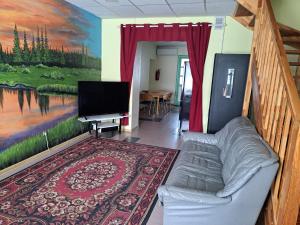 TV a/nebo společenská místnost v ubytování Kagu Hostel