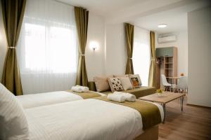 Postel nebo postele na pokoji v ubytování Villa Petra