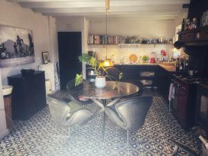 Χώρος καθιστικού στο Vakantiehuis in groene oase +9 φωτογραφίες