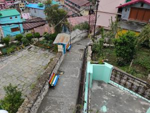 an overhead view of a city street with buildings at Yatra Homestay in Joshīmath