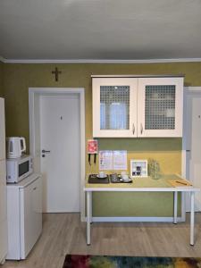Kuchyň nebo kuchyňský kout v ubytování Casa Andrea + 6 fotografií