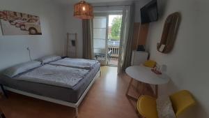 Rúm í herbergi á Barbara's Zimmer im Zentrum