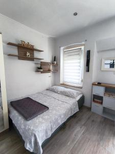 Posteľ alebo postele v izbe v ubytovaní Studio Placa