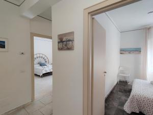 A bed or beds in a room at Casa Atena