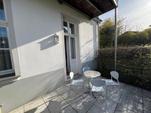 Balkón nebo terasa v ubytování Schöne Ferienwohnung in Seebad Bansin 200m vom Strand (Heringsdorf, Kaiserbäder, Usedom)